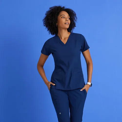 Vista 3 de BARCO ONE - Camiseta médica con cuello en V y 5 bolsillos, elástico de 4 vías, para mujer Índigo (Azul marino)