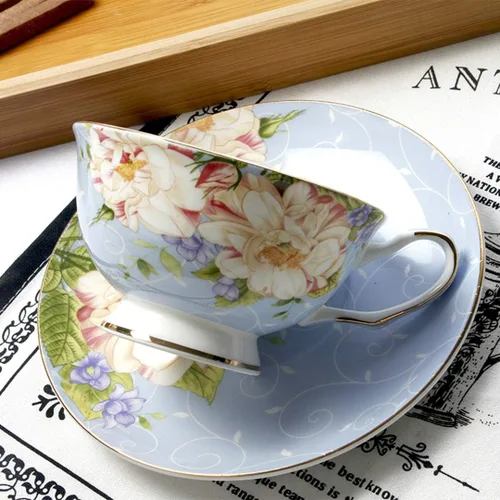 Vista 2 de Taza de té azul, juego de taza de té floral y platillo, juego de té de porcelana de hueso, taza de café, juego de té