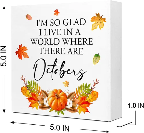 Vista 2 de Decoración de mesa de otoño, con texto en inglés "I'm so Glad I Live in a World Where There are Octobers", letrero de madera rústica, hojas