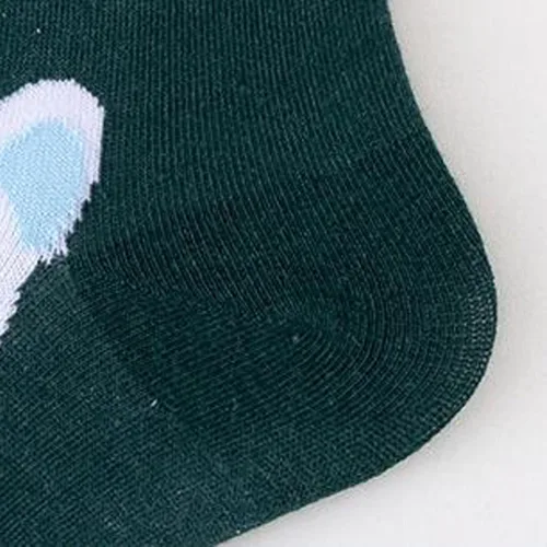 Vista 4 de Shiyingl Calcetines de Navidad para mujeres y hombres, calcetines de retazos estampados gráficos de Navidad de tubo alto, calcetines