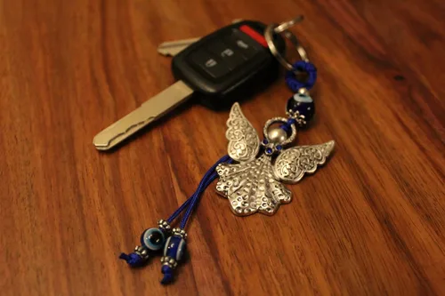 Vista 3 de LUCKBOOSTIUM Hermoso ángel con cristal azul y adorno colgante de mal de ojo, dijes de buena suerte, llaves del hogar, bolso, bolsos y accesorios