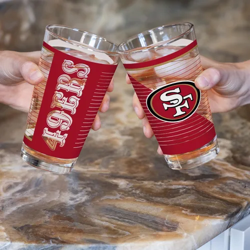 Vista 2 de Rico Industries NFL Football Main - Juego de 2 vasos clásicos de 16 onzas con logotipo impreso digitalmente, apto para lavavajillas NFL Football