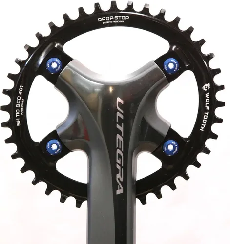 Vista 2 de Wolf Tooth Plato elíptico de grava para bicicleta de carretera 110 BCD de 4 pernos ovalada para bielas Shimano (40 dientes, PowerTrac)