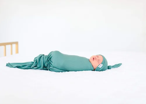 Vista 3 de Copper Pearl Gorro de bebé con nudo superior elástico y suave viaje Viaje Newborn0-4mo