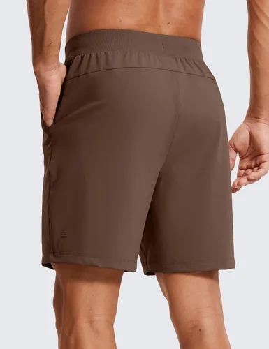 Vista 3 de CRZ YOGA Pantalones cortos de entrenamiento elásticos en cuatro direcciones para hombre, 7 pulgadas, suaves, duraderos, casuales, con bolsillos