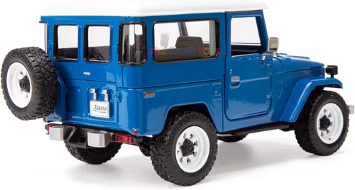 Vista 7 de All Star Toys Exclusivo Toyota Land Cruiser FJ40 Royal Blue con ruedas todoterreno personalizadas 1/24 modelo fundido a presión por Motormax 79323