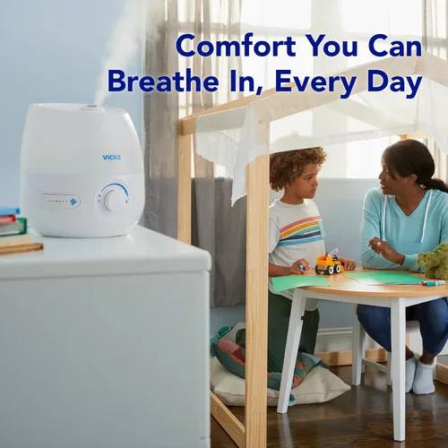 Vista 4 de Vicks Mini humidificador de vapor refrescante sin filtro, para habitación pequeña – Control de niebla variable – Funciona con Vicks VapoPads
