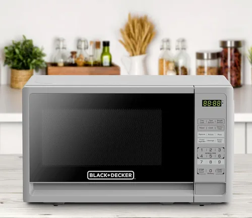 Vista 5 de BLACK+DECKER - Horno microondas compacto de sobremesa 0.7 pies cúbicos, 700 vatios, con iluminación LED, bloqueo infantil, color blanco