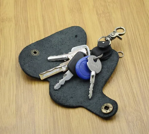 Vista 8 de Mejora la seguridad para evitar que se caiga de cuero genuino para llaves de puerta de coche, protector de llaves