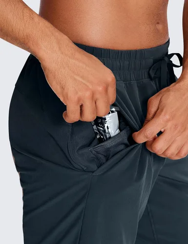 Vista 4 de CRZ YOGA Pantalones cortos de correr 2 en 1 para hombre con forro 5, 7 y 9 pulgadas, de secado rápido, pantalones cortos deportivos con bolsillos