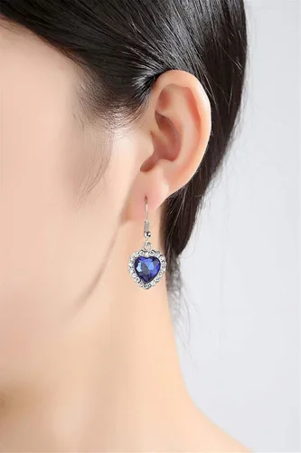 Vista 2 de HMOOY Titanic Heart of The Ocean - Juego de collar y pendientes de zafiro azul diseño de corazón azul y cristales de rubí para mujeres y niñas
