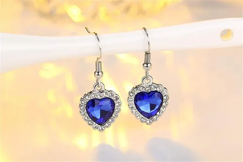 Vista 4 de HMOOY Titanic Heart of The Ocean - Juego de collar y pendientes de zafiro azul diseño de corazón azul y cristales de rubí para mujeres y niñas