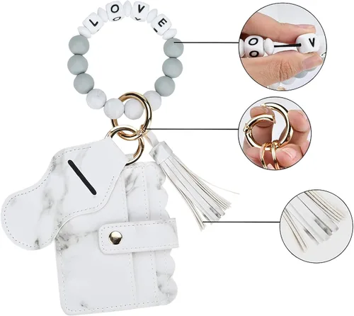 Vista 2 de Abitoncc Llavero de pulsera para mujer, de silicona, con cuentas y soporte para lápiz labial, borla