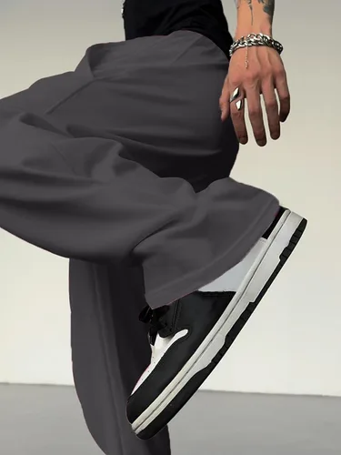 Vista 3 de OYOANGLE Pantalones deportivos holgados con cordón y cintura elástica Y2K para hombre, pantalones largos sueltos de pierna ancha con bolsillo