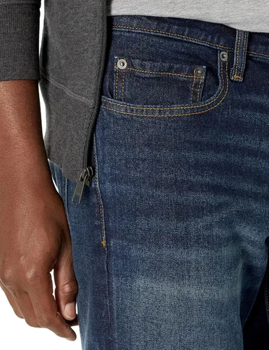 Vista 3 de Tienda Essentials Jeans elásticos ajustados con corte de bota para hombre