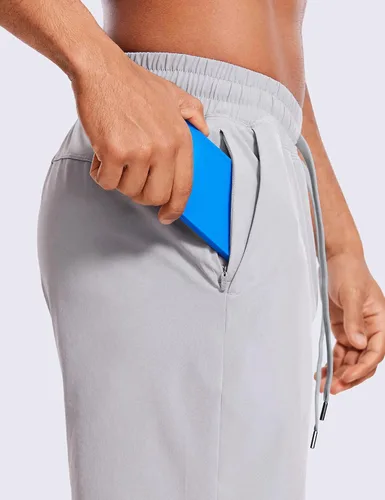 Vista 4 de CRZ YOGA Pantalones cortos de entrenamiento sin forro para hombre, 9 pulgadas, secado rápido, para correr, deportes, atletismo, gimnasio