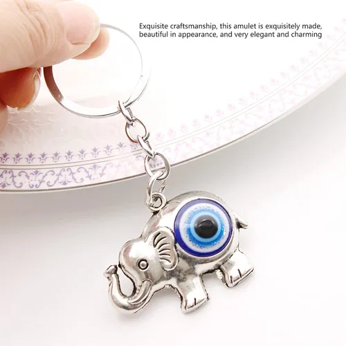 Vista 3 de Llavero de elefante lindo para mujer, colgante de aleación de diamantes de imitación de cristal, llavero de ojo azul para bolsa de llaves, teléfono