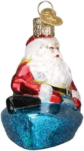 Vista 3 de Old World Christmas - Adorno de Navidad único de 2020, Santa en kayak, de vidrio soplado para decoración del árbol de Navidad