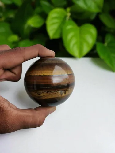 Vista 4 de Bola de cristal tallada de cristal tallada con forma de esfera de piedra lunar arcoíris grande y llamativa, bolas de citas de meditación
