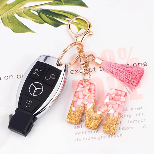 Vista 3 de Suweibuke Lindos llaveros rosados para mujeres y niñas, llaveros de letra inicial con borla, dijes para llaves, bolsos, mochilas