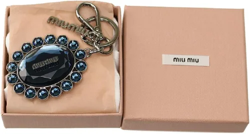 Vista 5 de Prada Miu Miu Trick Oval Cristal Azul Oscuro Plex Charm Llavero 5TM092