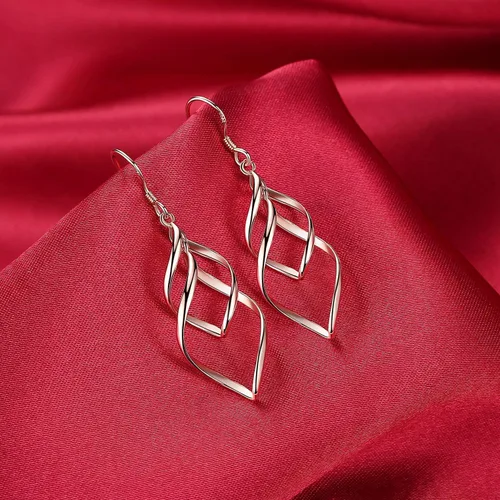 Vista 6 de Desimtion - aretes chapados en oro con forma de onda, plata fina