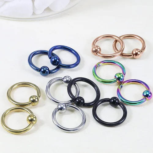 Vista 5 de Kridzisw 24 anillos de acero quirúrgico de 12 G con cuentas cautivas para la nariz tabique ceja labio pezón lengua ombligo joyería para mujeres