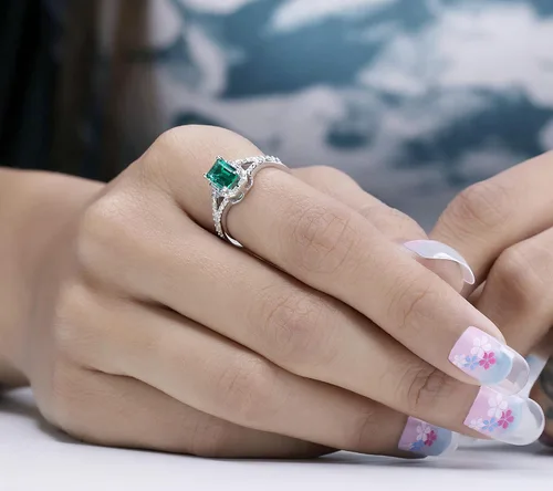 Vista 2 de Dazzlingrock Collection 7x5mm Emerald Cut Lab Created Emerald & Round White Diamond Halo Split Shank Engagement Ring for Women in 925 Sterling Silver