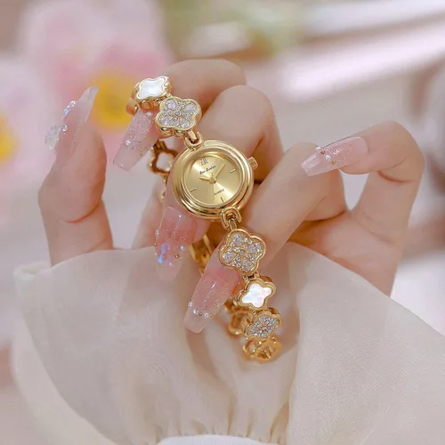 Vista 3 de Gosasa Reloj vintage dorado para mujer, pulsera de cadena de cuatro hojas huecas, delicado y pequeño, reloj de cuarzo, impermeable, regalo de lujo
