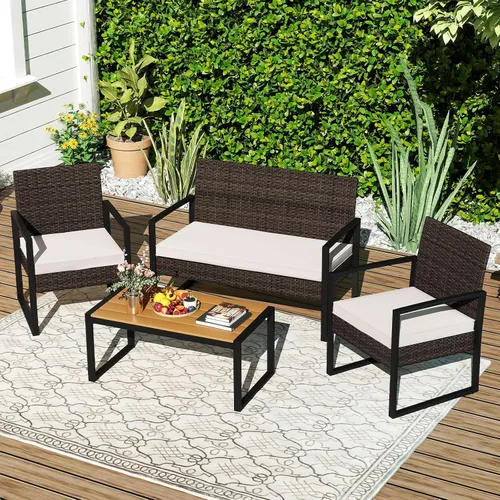 Vista 2 de Tangkula Juego de muebles de patio de 4 piezas, juego de conversación de ratán para exteriores con sillas acolchadas y mesa de centro de plástico