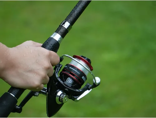 Vista 4 de Juego combinado de caña de pescar, 6.9 ft/6.89 pies, 2 cañas plegables, 2 carretes giratorios, bolsa de transporte, cañas de pescar telescópicas