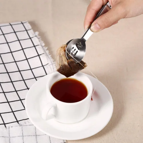 Vista 3 de Pinzas para exprimir bolsas de té, cuchara para bolsa de té, mini y ligeras, duraderas, resistentes a la corrosión, mango ergonómico