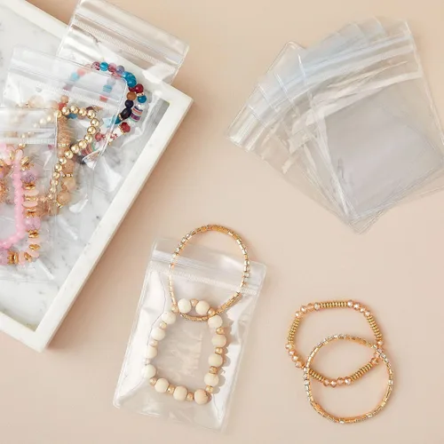 Vista 2 de Stockroom Plus Paquete de 100 bolsas de plástico transparente para joyas, aretes, collares, mini bolsas resellables para pequeñas empresas