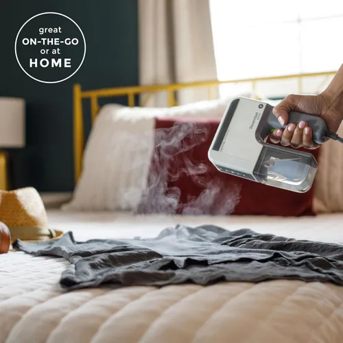 Vista 3 de Steamfast NOMAD - Vaporizador portátil de viaje para ropa, vaporizador de mano para ropa con calentamiento de 30 segundos, tiempo de vapor de 11