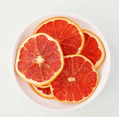 Vista 2 de Rebanadas de toronja seca de alta calidad, 3.5 onzas/3.53 oz, pomelo deshidratado, 100% natural, sin aditivos y sin azúcar añadido.