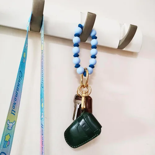 Vista 5 de Junyuerly Pulsera Llavero de Silicona con Cuentas para Mujeres, Brazalete Elástico con Anillo de Llaves Cuenta azul