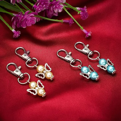 Vista 5 de Hicarer 100 llaveros de ángel con perlas de ángel, llavero de bautismo, regalos de devolución de invitados, llaveros para niñas y niños, baby