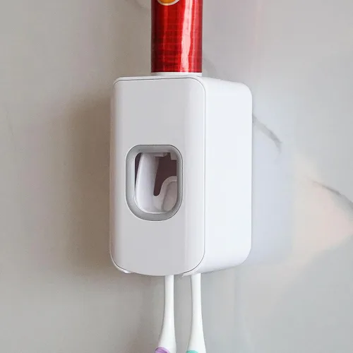 Vista 23 de Soporte de plástico para cepillos de dientes de 2 ranuras y dispensador de pasta de dientes montado en la pared, exprimidor automático de pasta