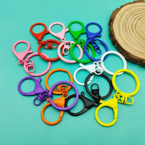Vista 6 de 30 llaveros con cierre de langosta para hacer joyas, coloridos clips de gatillo giratorios de metal con cierres giratorios, clips de gancho, anillo