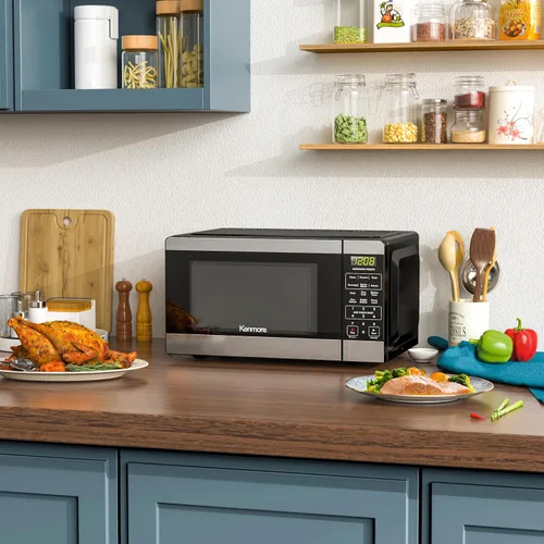 Vista 7 de Microondas de mostrador Kenmore, 6 menús preestablecidos automáticos, bloqueo para niños, funciones de descongelación y cocina exprés, 700 vatios, 7