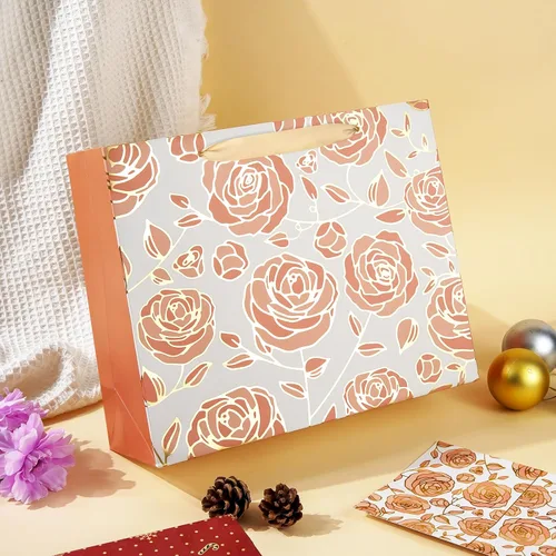 Vista 5 de DecorWoo Bolsa de regalo grande de oro rosa de 13 pulgadas, bolsa de regalo floral con papel de seda y tarjeta de felicitación, elegantes bolsas