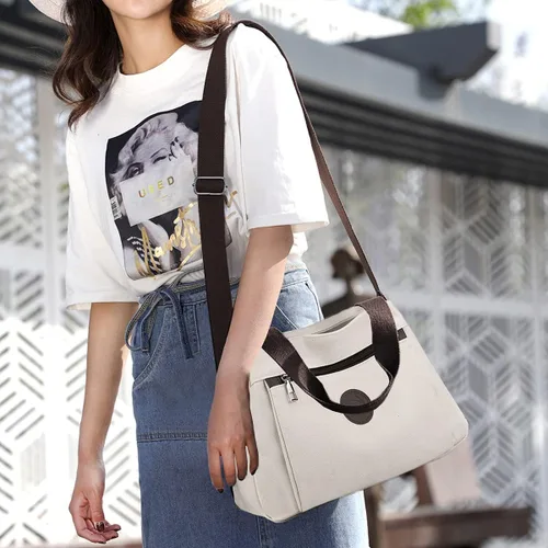 Vista 2 de Bolsos tipo morral de lona para mujer, bolsos cruzados de hombro, cartera con múltiples compartimentos, tamaño mediano Beige - Medium