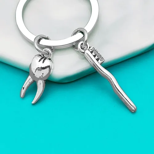 Vista 5 de Xiahuyu Regalos para dentistas para mujeres y hombres, regalo de higienista dental, llavero de día diferente, regalo de asistente dental, regalo