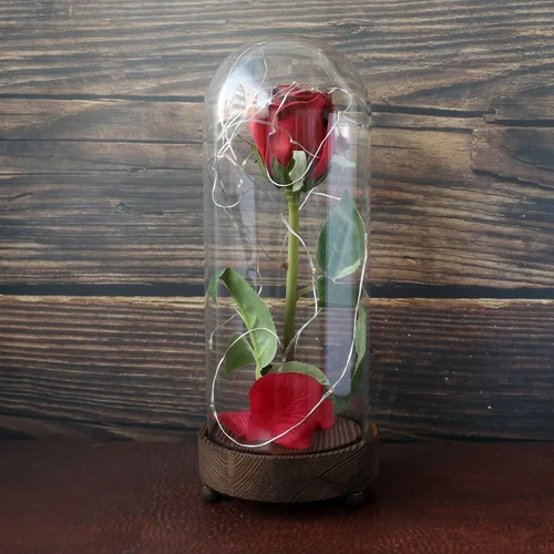 Vista 4 de CVHOMEDECO. Funciona con pilas con temporizador LED iluminado y rosa de poliuretano roja con pétalos caídos en una cúpula de cristal, gran regalo