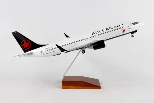 Vista 10 de Daron Skymarks Air Canada 737MAX8 1/100 con soporte de madera y engranaje