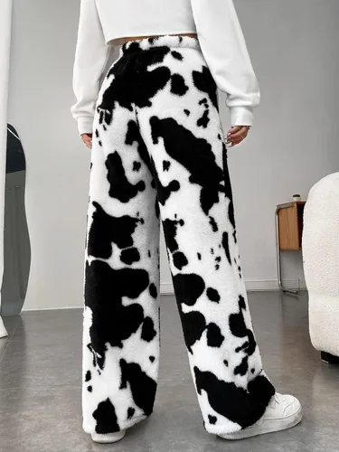 Vista 2 de WDIRARA Pantalones cálidos y mullidos con estampado de vaca para mujer