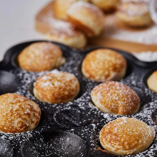 Vista 8 de Victoria - Sartén de hierro fundido para poffertjes holandeses con asas de bucle, precurada con aceite de linaza, fabricada en Colombia
