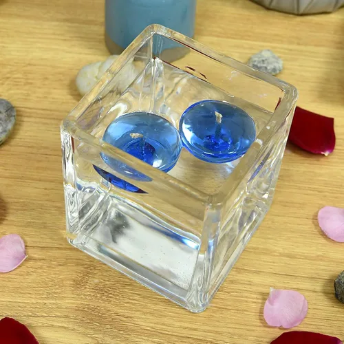 Vista 5 de Zest Candle Velas flotantes de 12 piezas, 1.75 pulgadas, gel azul transparente