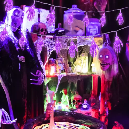 Vista 6 de JMEXSUSS Guirnalda de luces moradas de Halloween, 15.2 pies, 30 luces LED de mano de esqueleto, funciona con pilas, luces de Halloween