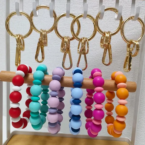 Vista 4 de Llavero de silicona con cuentas para mujer, pulsera elástica para llavero